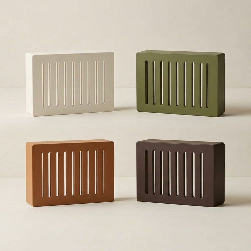 Louver doorbell chime covers in white, green, caramel and dark brown, each with vertical slots