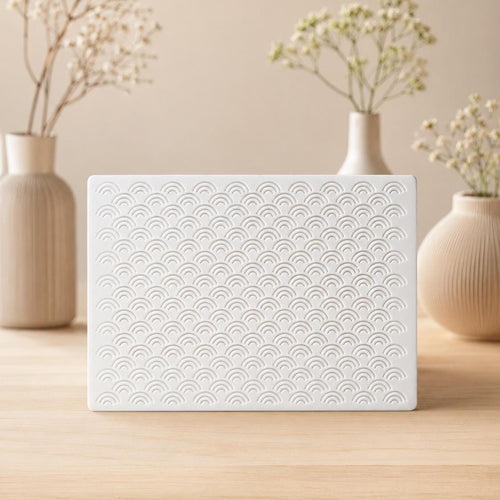White Arches doorbell chime cover on wood, stacked-arch pattern — Iledecor