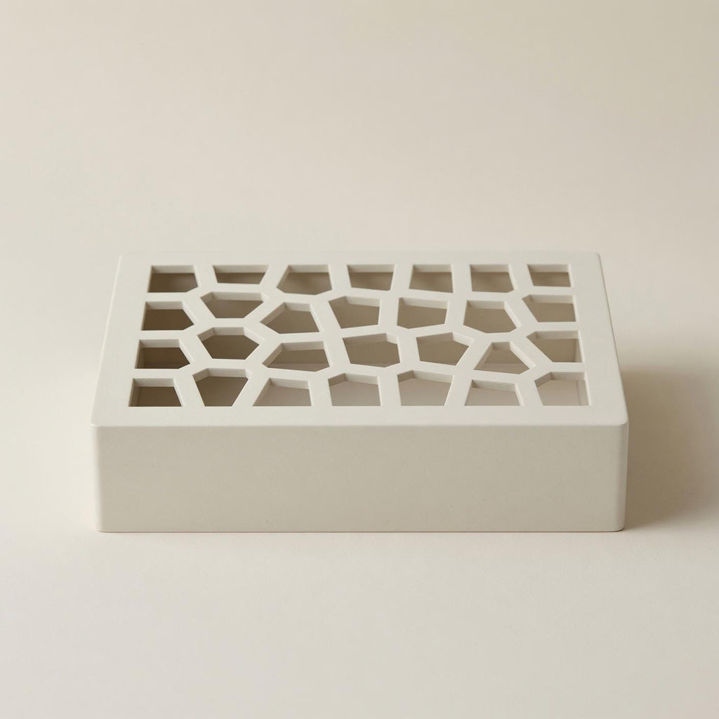 Front view of the Voronoi doorbell chime cover cell lattice
