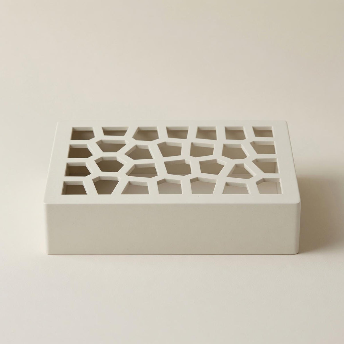 Front view of the Voronoi doorbell chime cover cell lattice