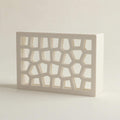 White Voronoi doorbell chime cover at an angle, cell lattice — Iledecor
